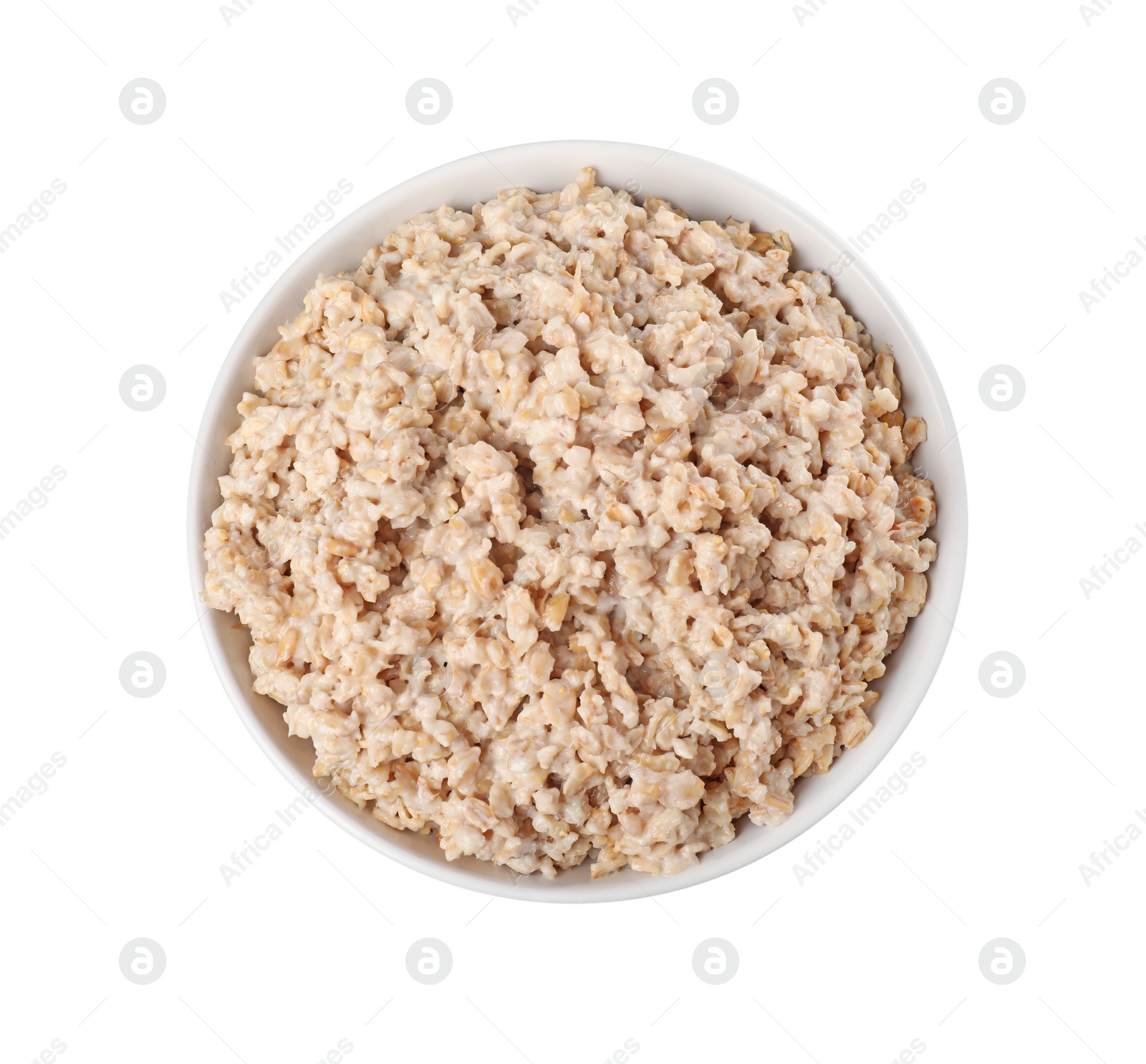 Photo of Tasty boiled oatmeal in bowl isolated on white, top view