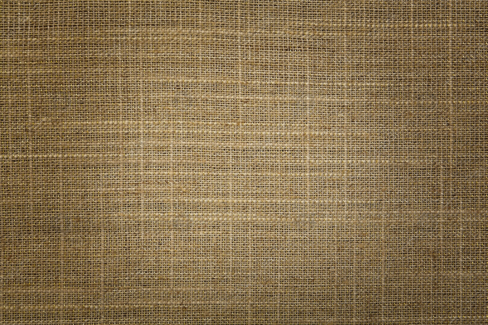 Image of Texture of natural burlap fabric as background, top view. Vignette effect 