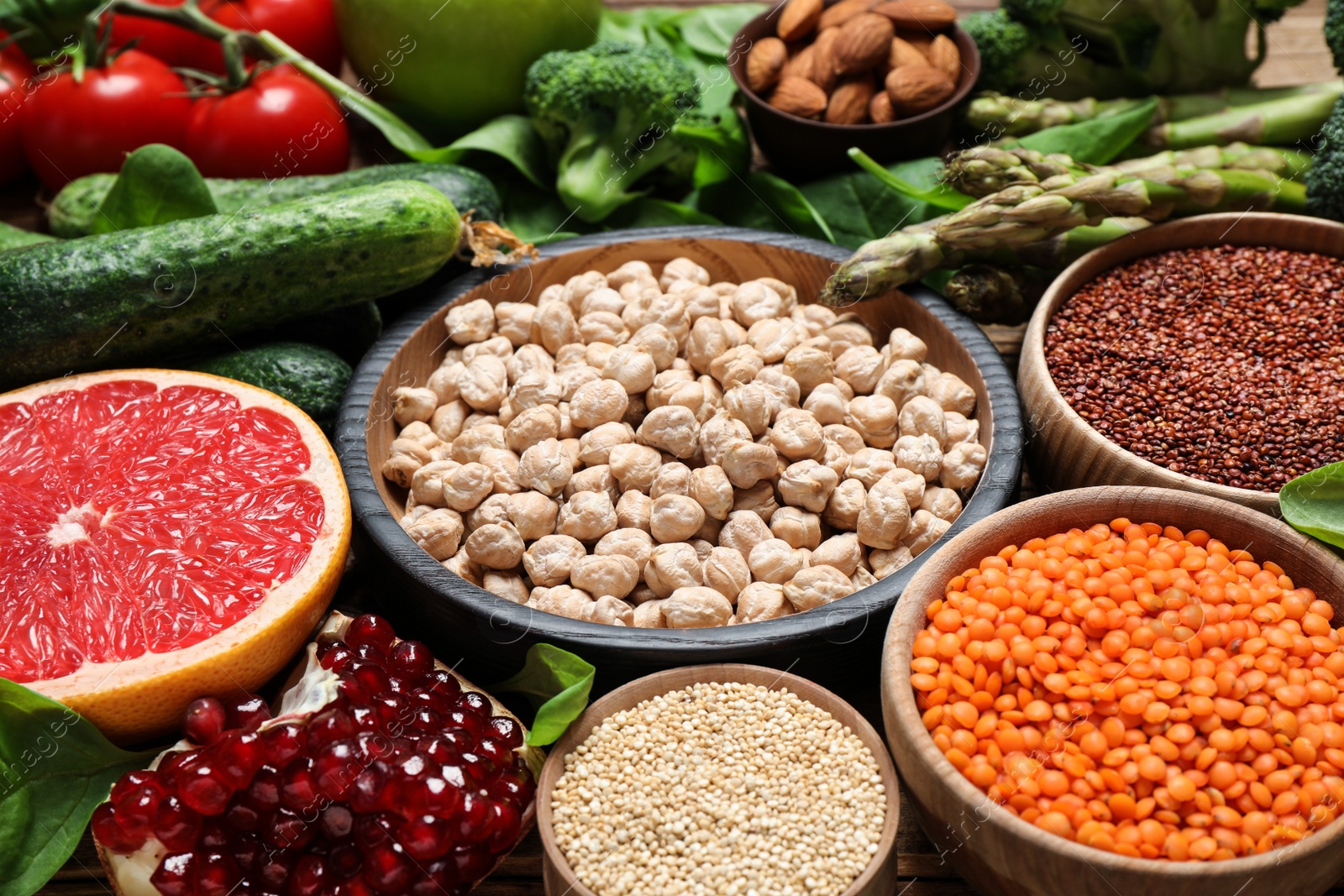 Photo of Fresh fruits and seeds, vegetables on table, closeup