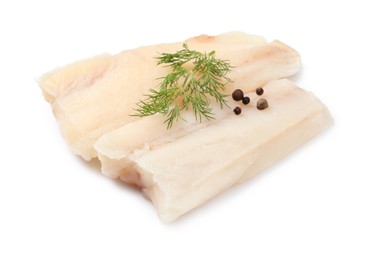 Photo of Pieces of raw cod fish, dill and peppercorns isolated on white