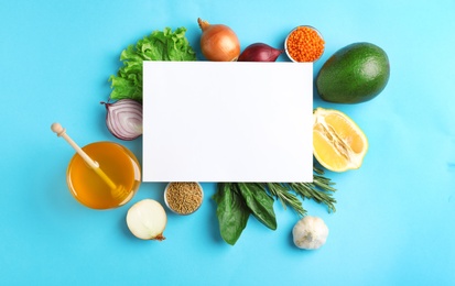 Photo of Natural products and blank card with space for text on color background, top view. Home remedies for asthma