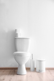 New ceramic toilet bowl in modern bathroom