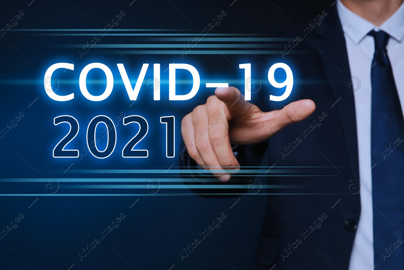 Image of COVID-19 predictions for 2021 year. Man touching virtual screen on dark background, closeup