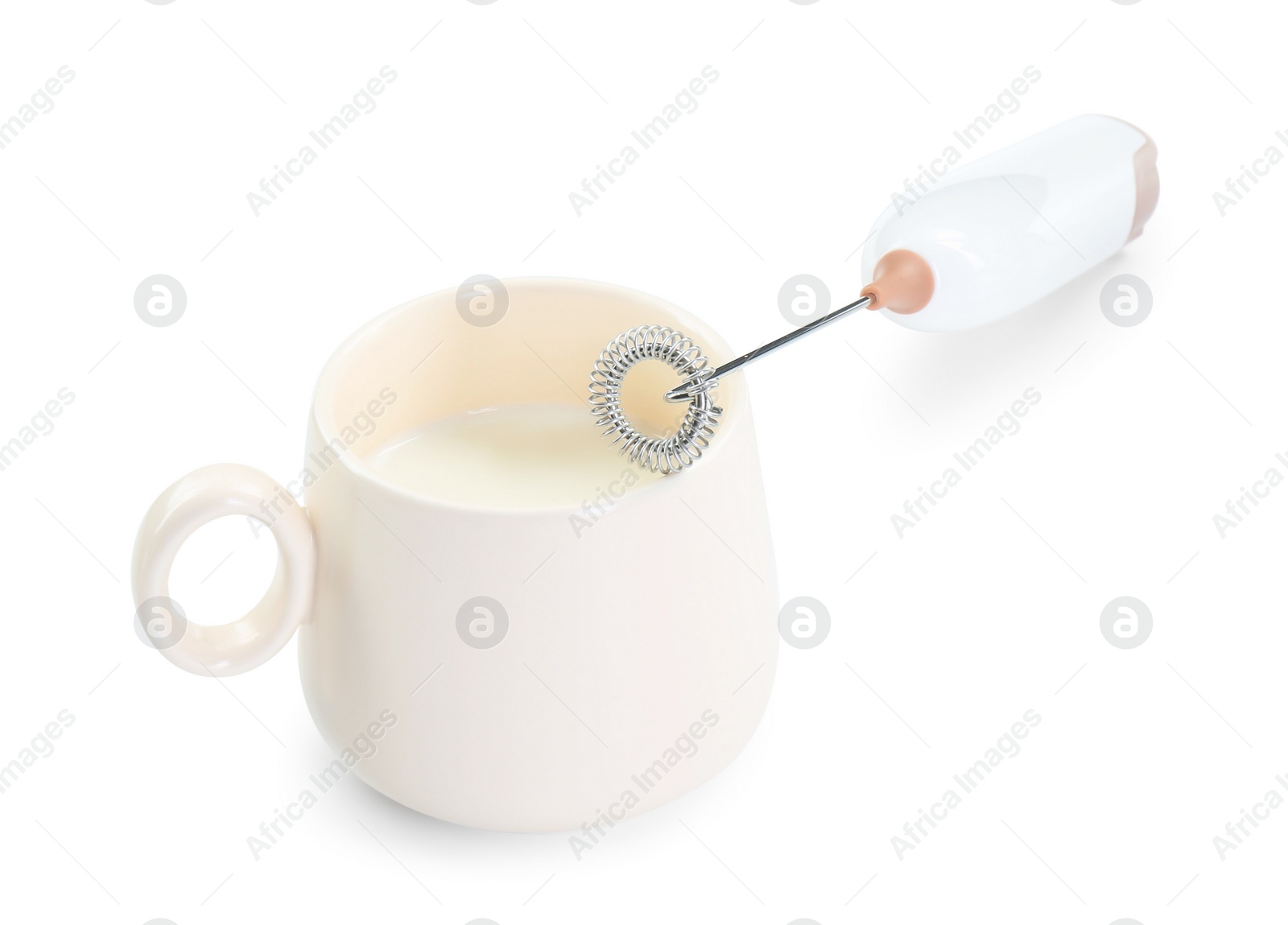 Photo of Milk frother wand and cup isolated on white