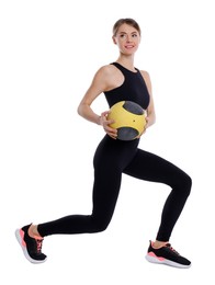 Photo of Athletic woman doing exercise with medicine ball isolated on white