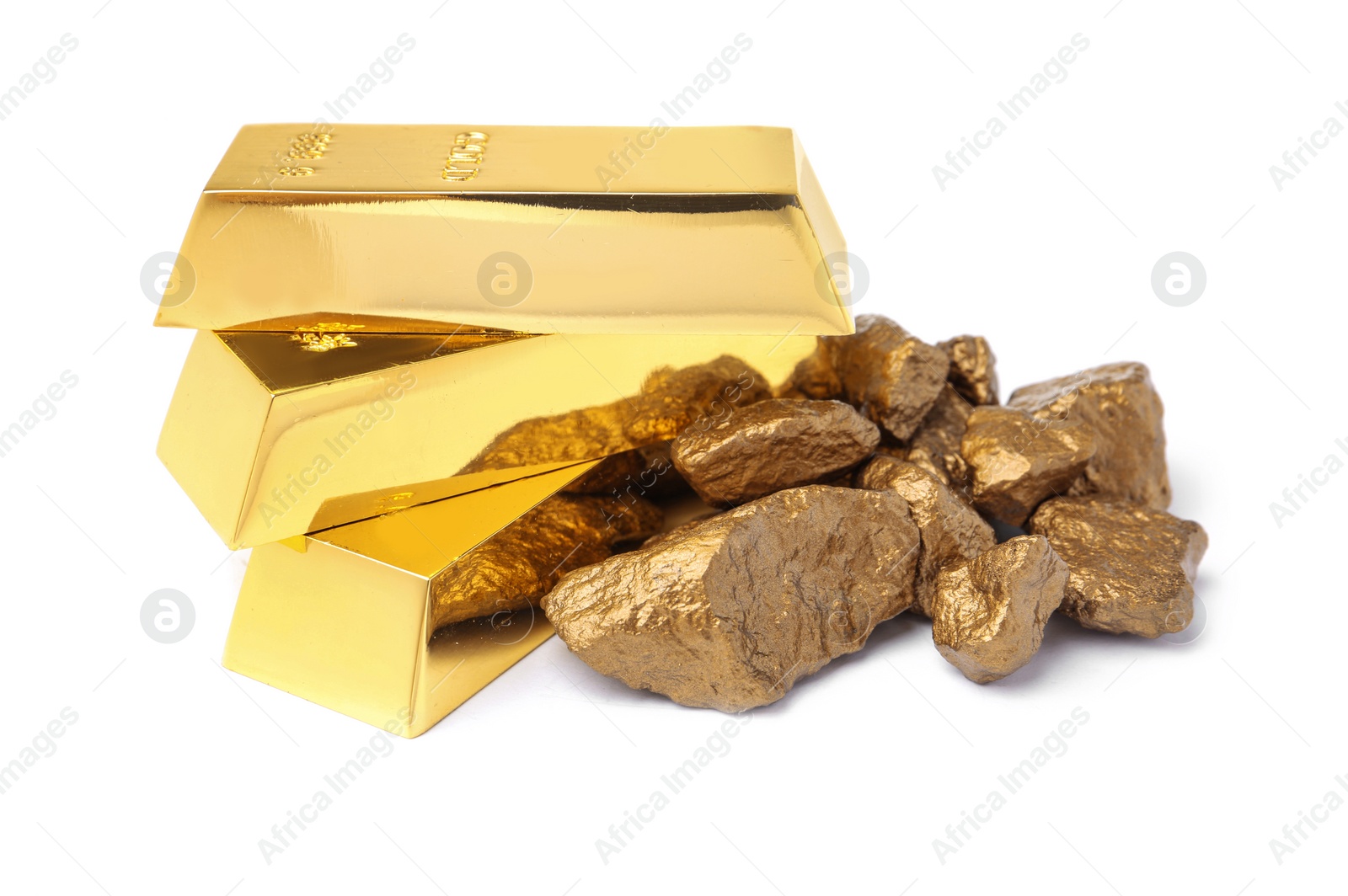 Photo of Gold nuggets and ingots on white background