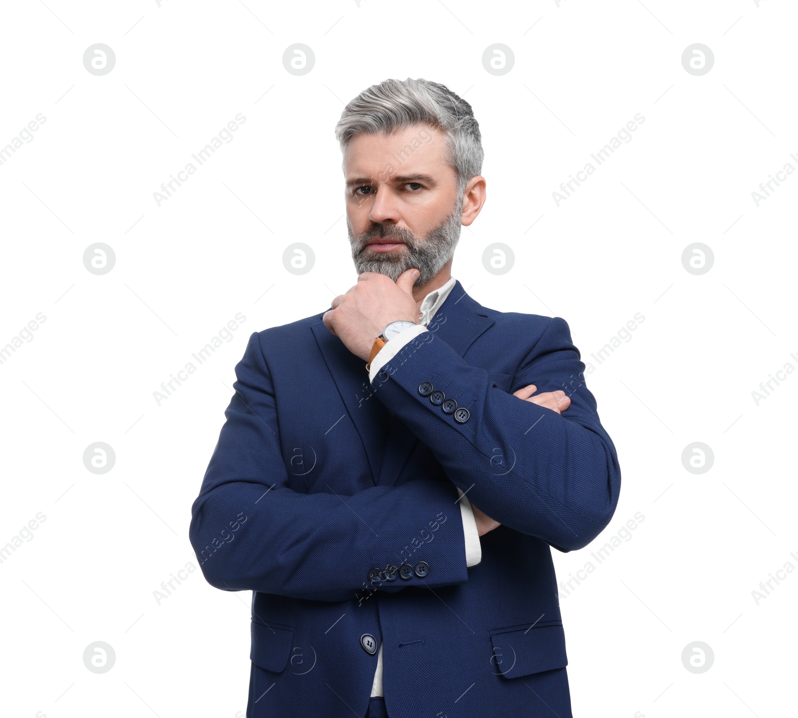 Photo of Mature businessman in stylish clothes posing on white background, low angle view