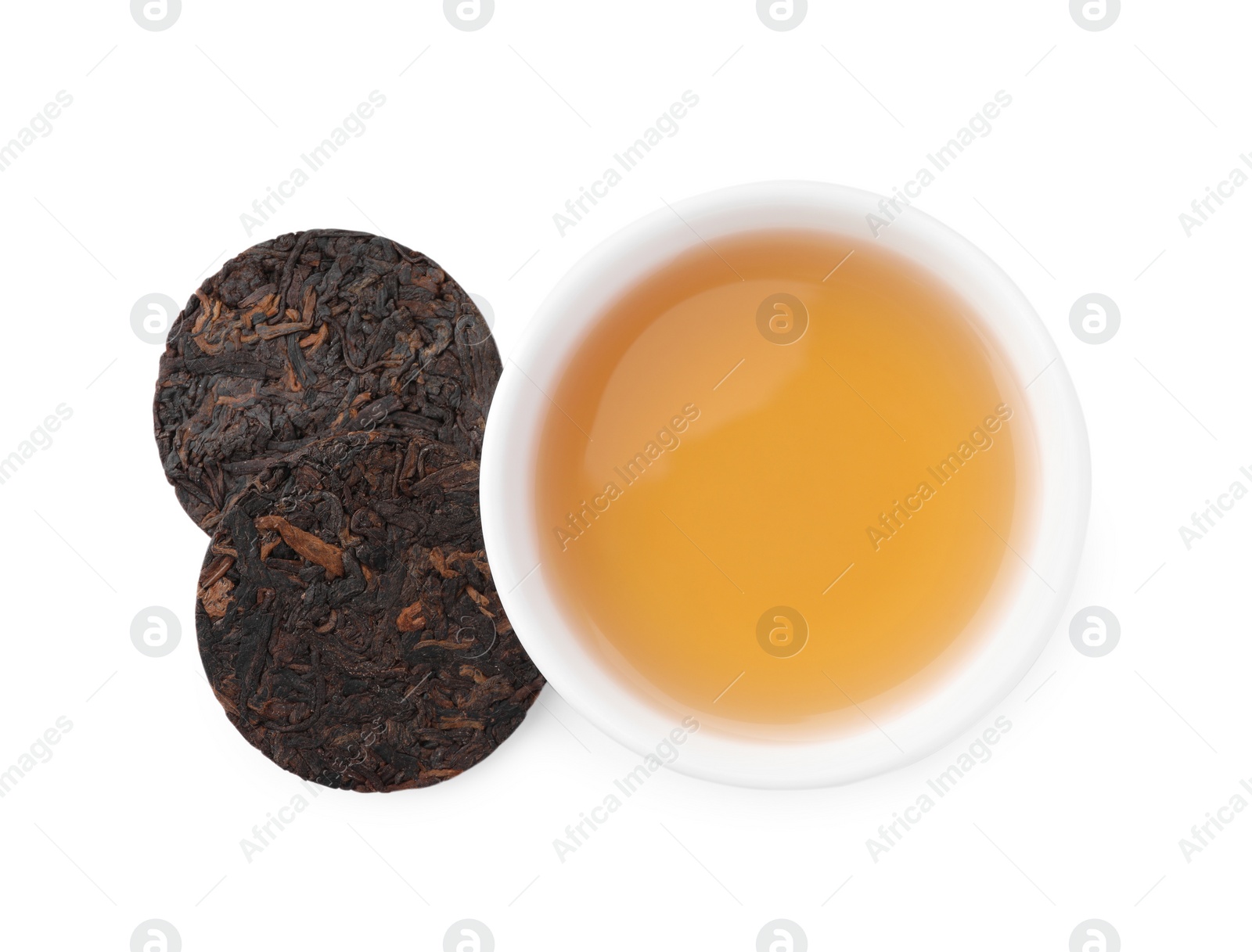 Photo of Traditional Chinese pu-erh tea and freshly brewed beverage isolated on white, top view