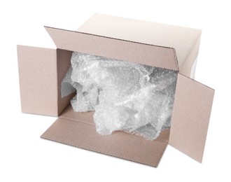 Photo of Transparent bubble wrap in cardboard box isolated on white