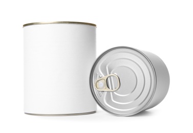 Photo of Closed tin cans isolated on white, mockup for design