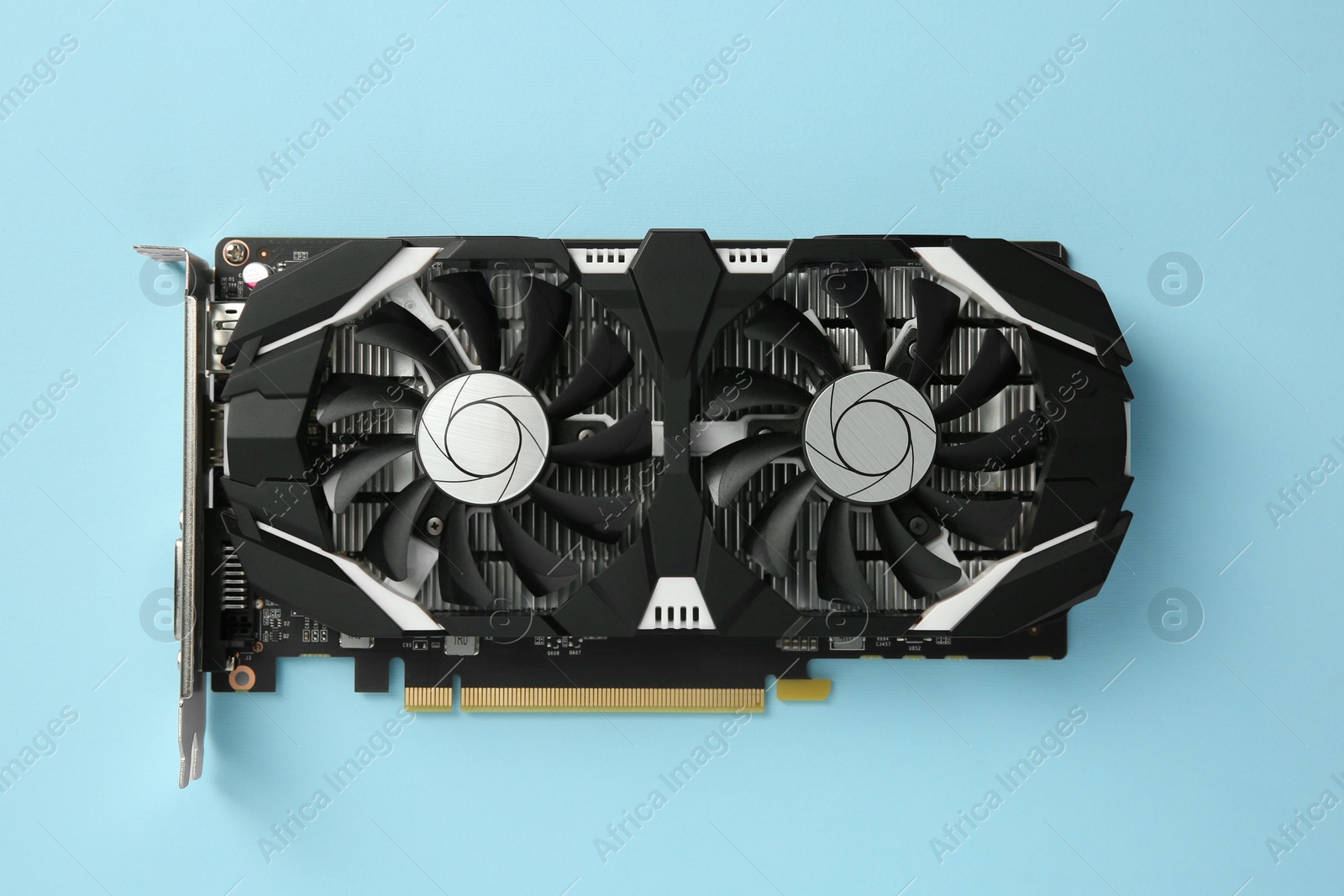 Photo of Computer graphics card on light blue background, top view