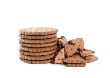 Photo of Tasty chocolate sandwich cookies with cream on white background