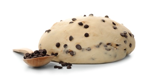 Raw wheat dough and spoon with chocolate chips on white background