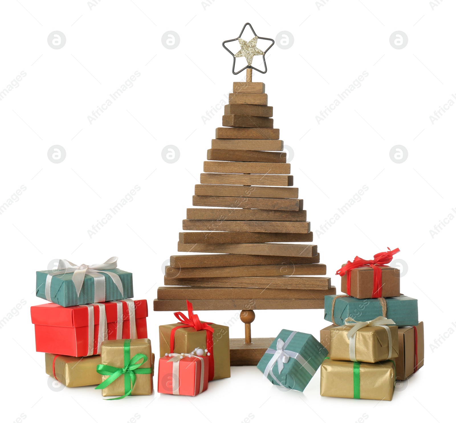 Photo of Decorative wooden Christmas tree with gift boxes on white background