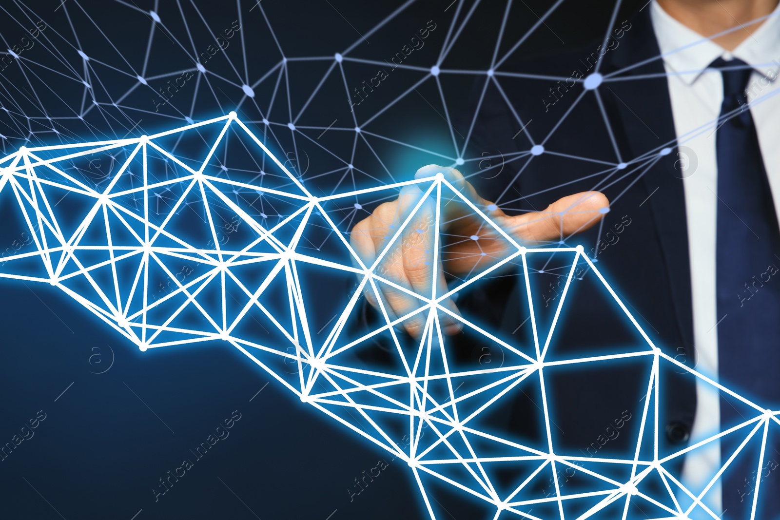 Image of Man using virtual screen with connection lines presenting innovation network linkage on dark background