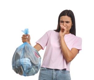 Photo of Woman holding full garbage bag on white background