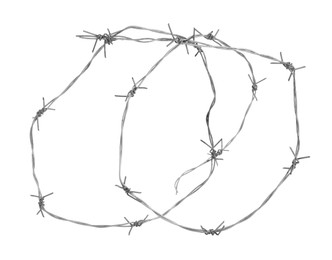 Photo of Shiny metal barbed wire isolated on white