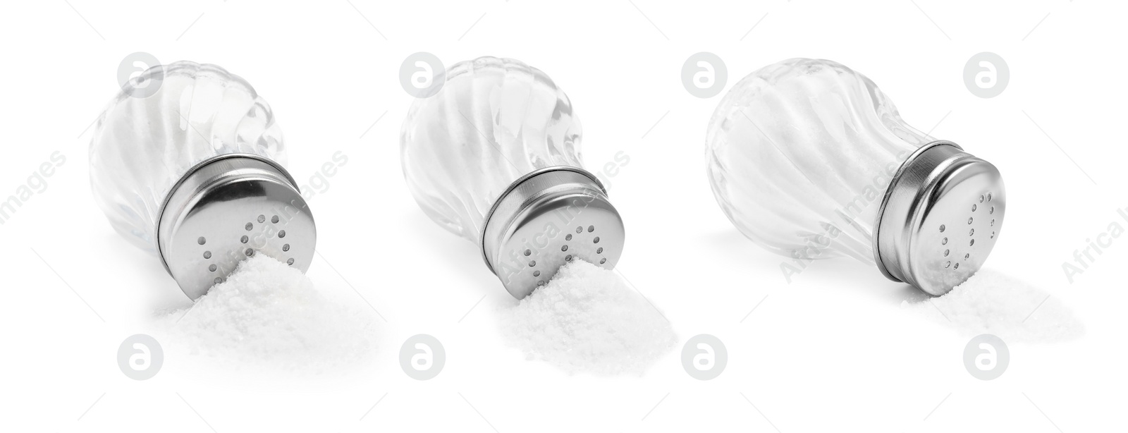 Image of Natural salt in glass shakers isolated on white, set