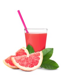 Glass of grapefruit juice, fresh fruit and green leaves on white background