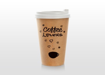 Takeaway paper cup with printed phrase Coffee Lovers isolated on white