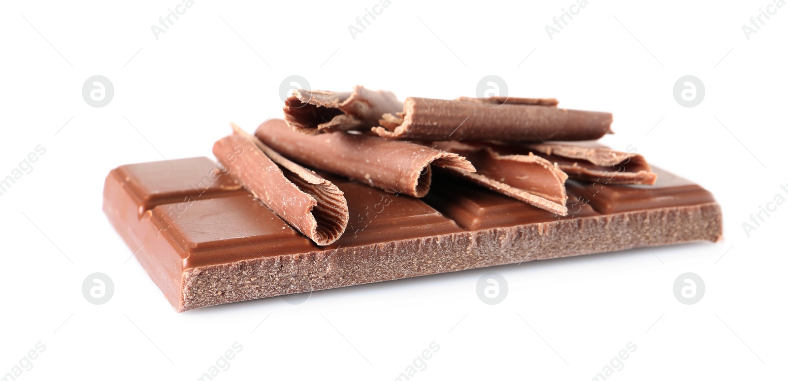 Photo of Chocolate curls and bar isolated on white