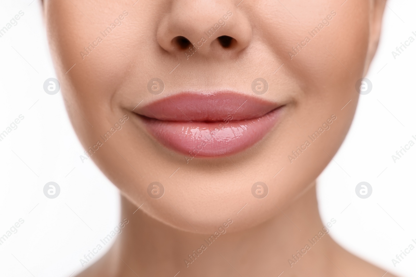 Photo of Woman with beautiful lips on white background, closeup