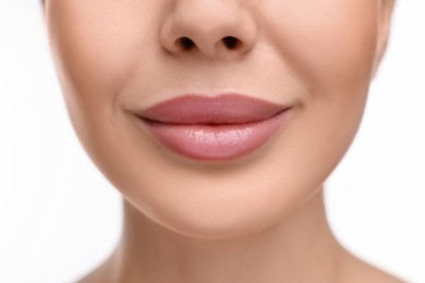 Photo of Woman with beautiful lips on white background, closeup