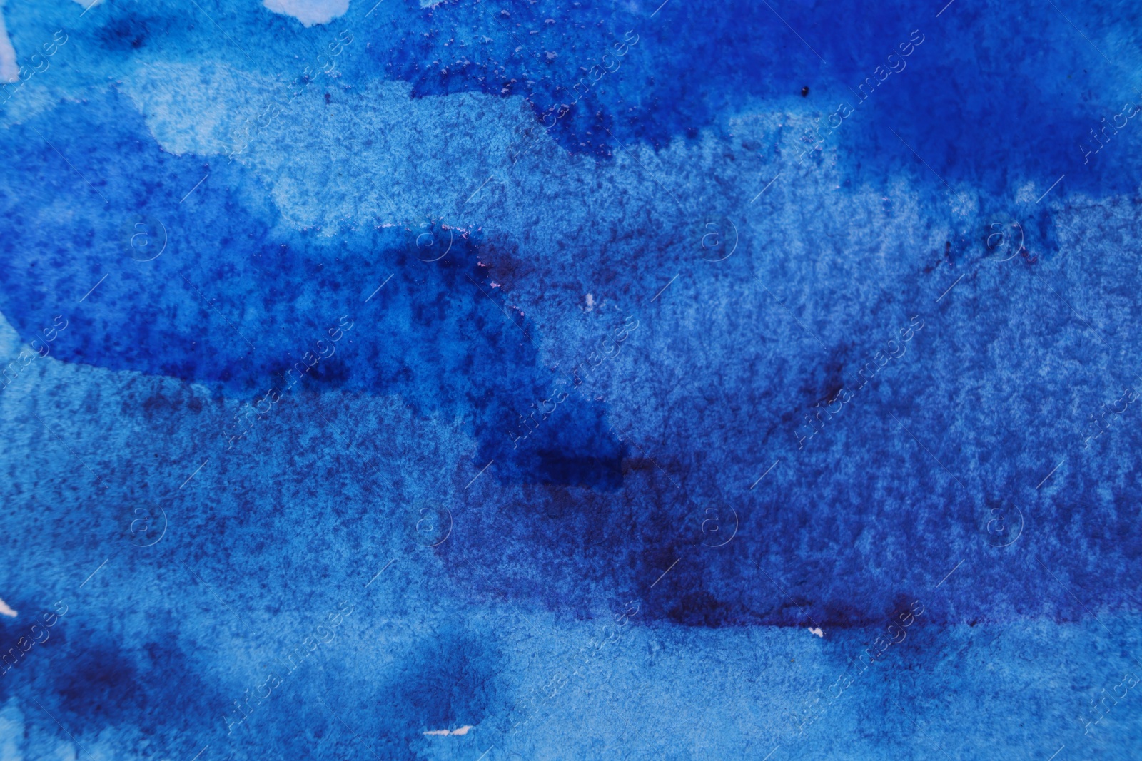 Photo of Abstract blue watercolor painting as background, top view