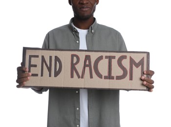 African American man holding sign with phrase End Racism on white background, closeup