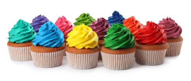 Different delicious colorful cupcakes on white background