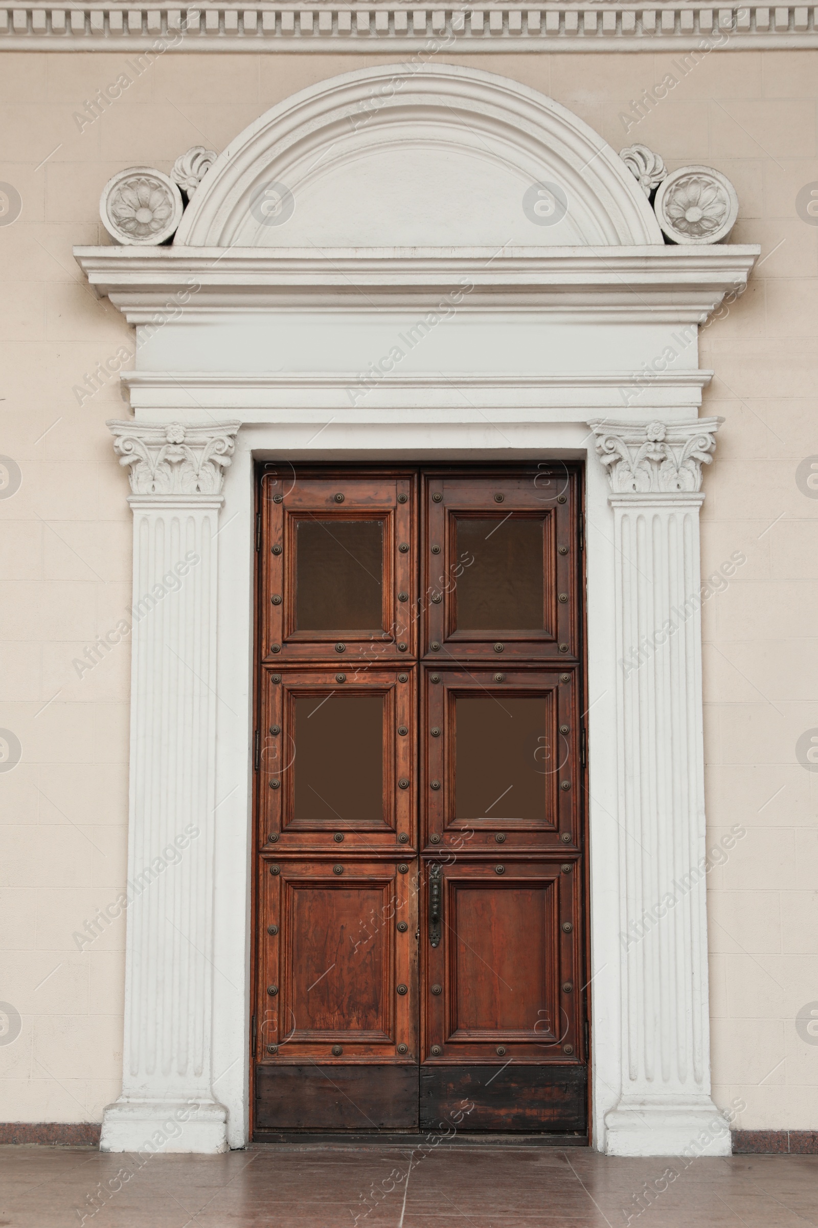 Photo of Building with vintage wooden door. Exterior design