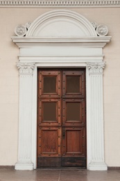 Photo of Building with vintage wooden door. Exterior design