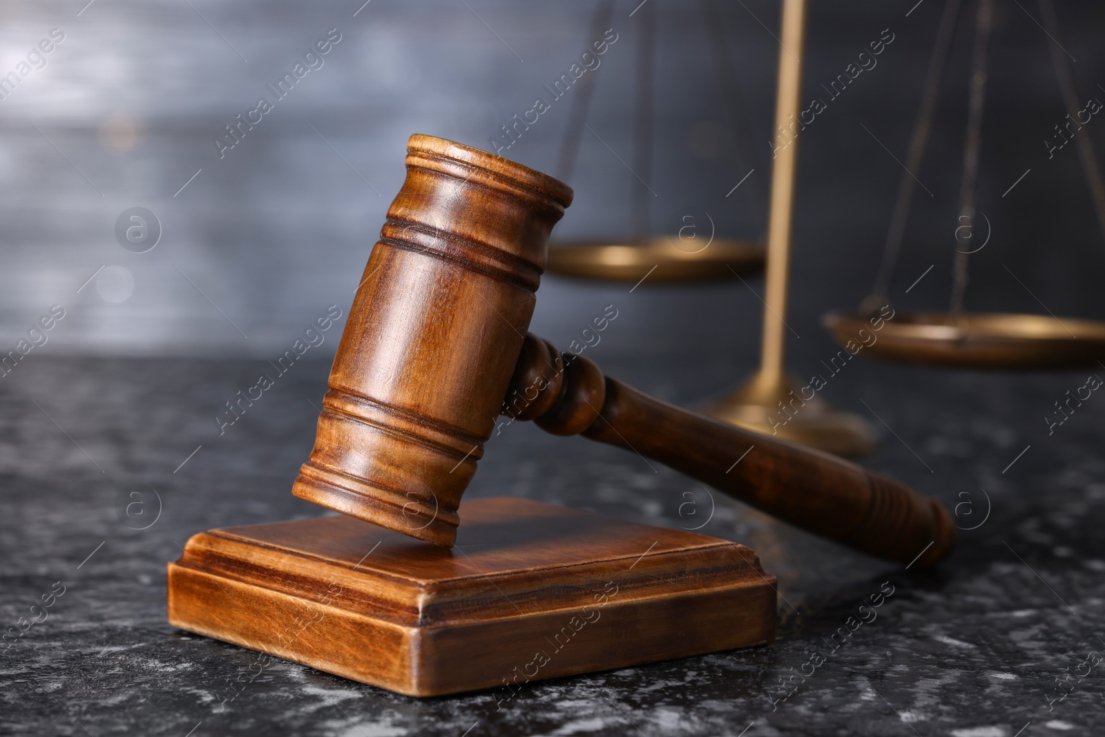 Photo of Law concept. Judge's gavel on dark table, closeup