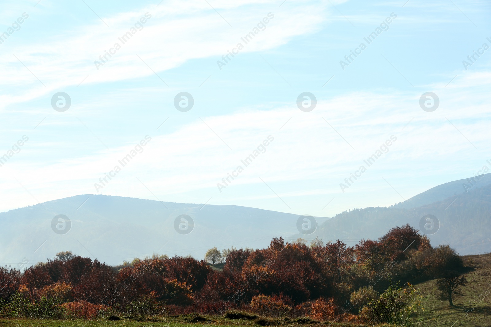 Photo of Beautiful landscape with blue sky over mountain slopes