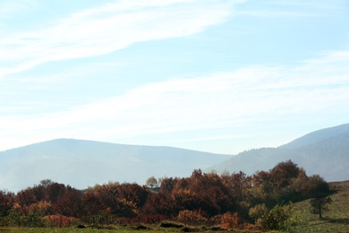 Photo of Beautiful landscape with blue sky over mountain slopes