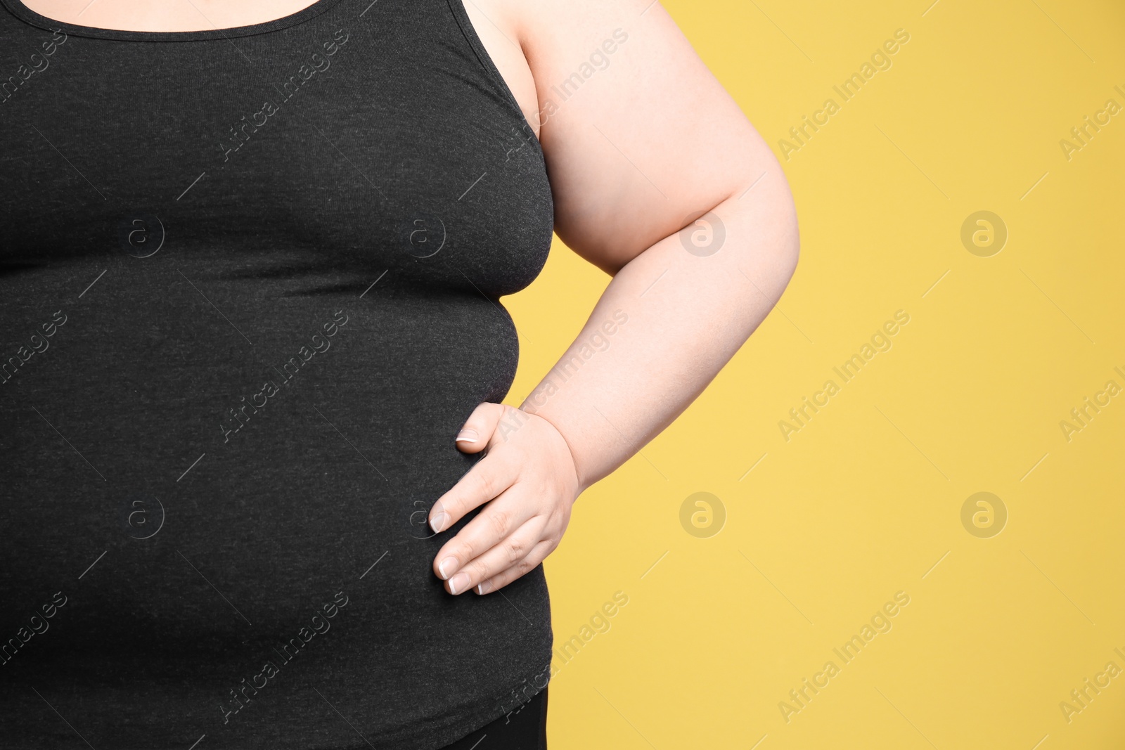 Photo of Overweight woman on color background