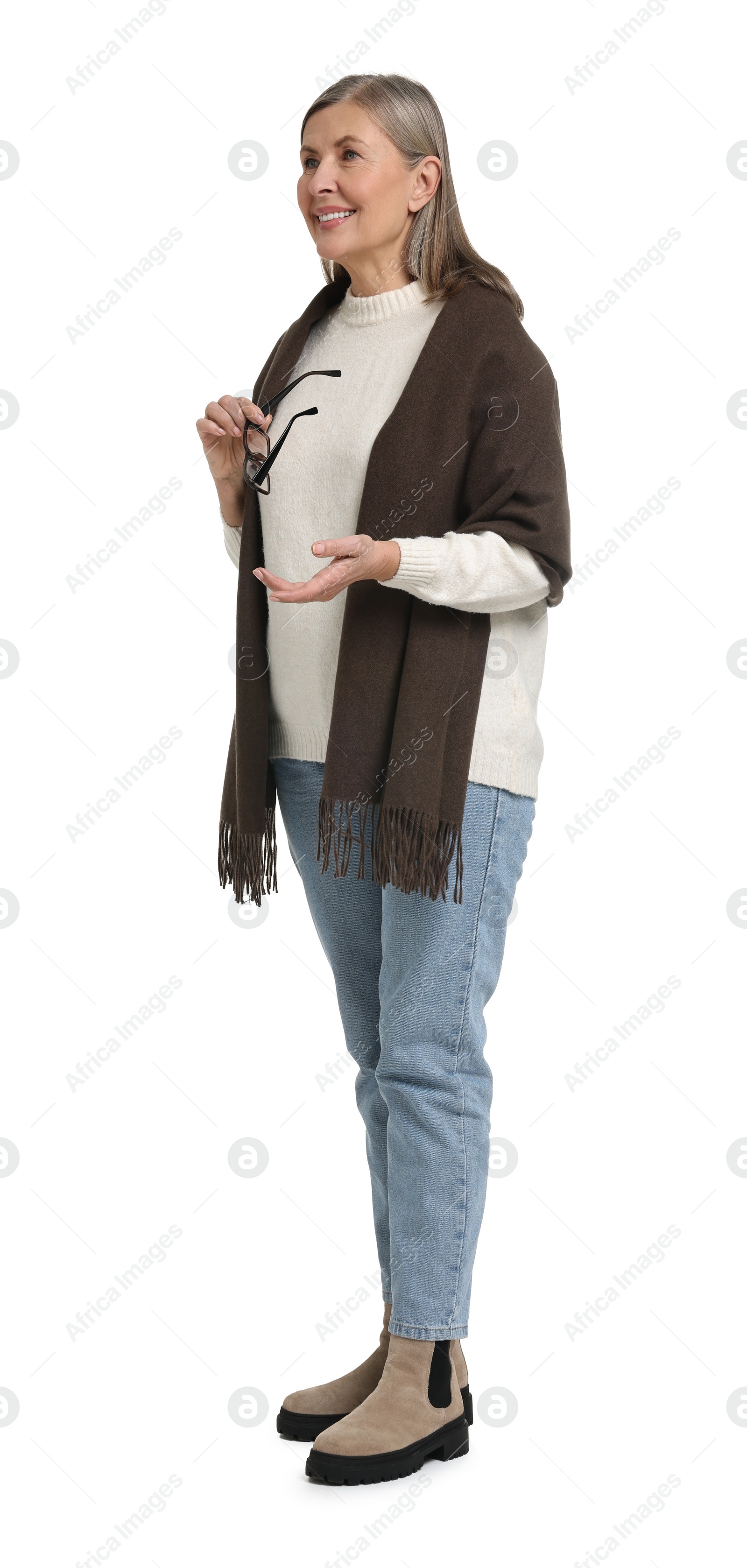 Photo of Full length portrait of senior woman on white background