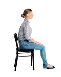 Woman sitting on chair against white background. Posture concept