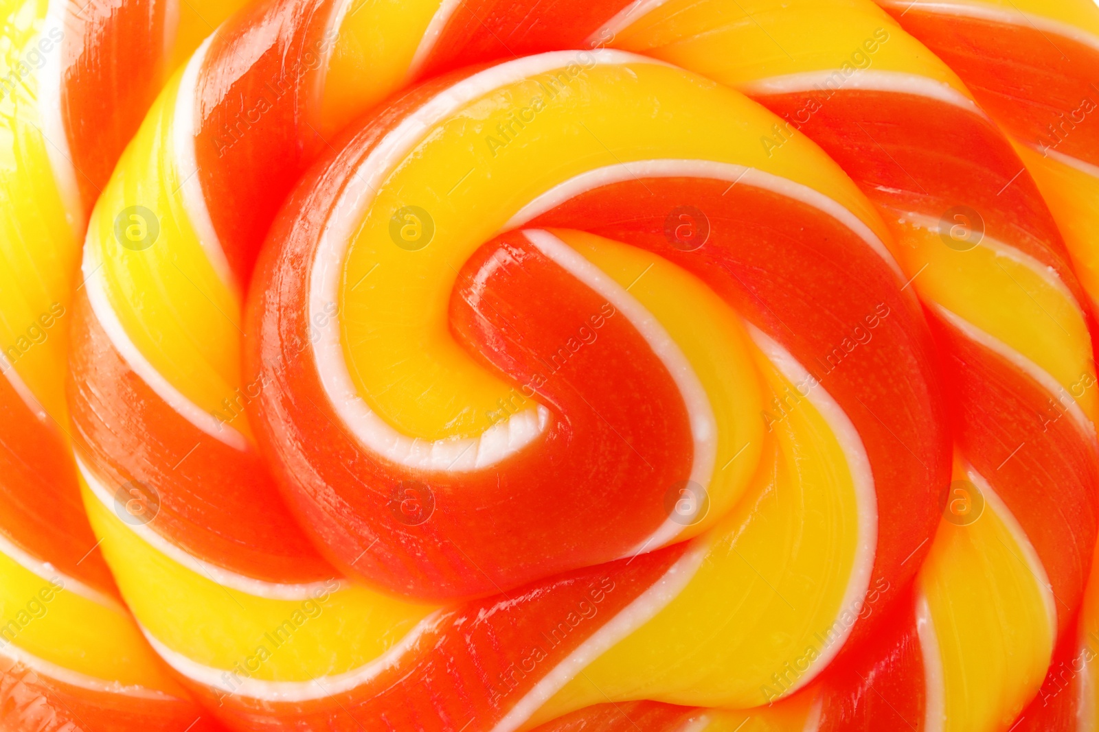 Photo of Tasty colorful fruit flavored candy as background, closeup