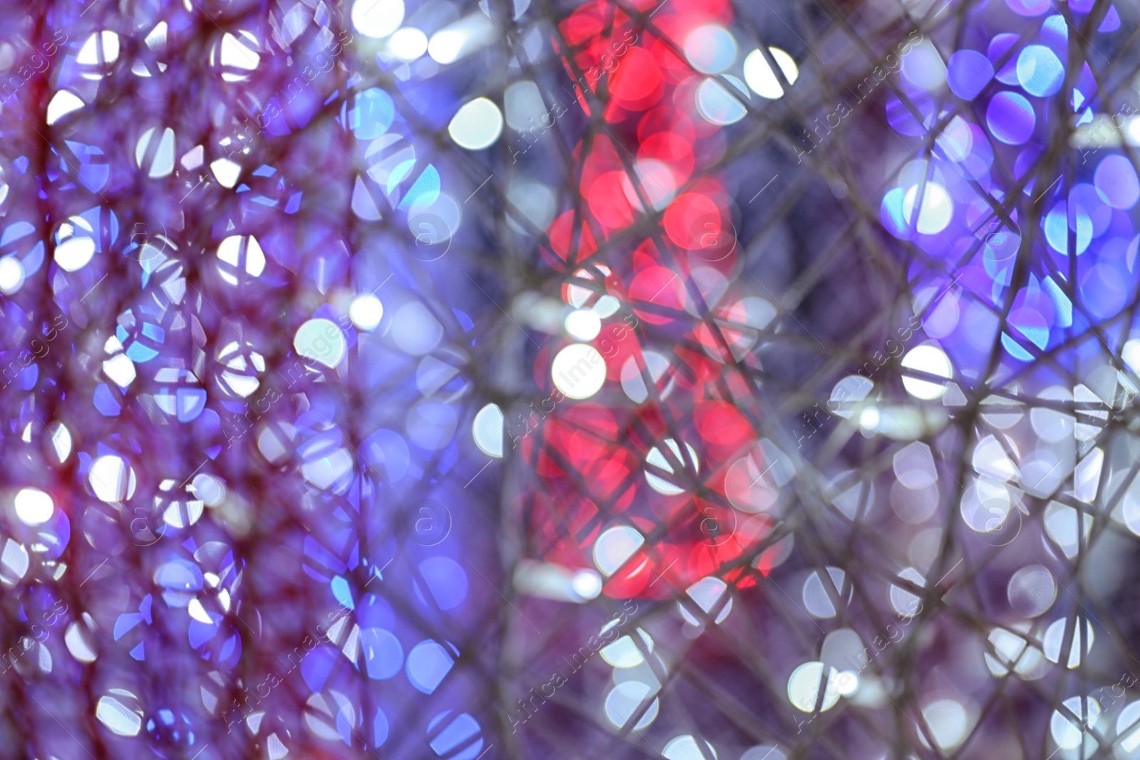 Photo of Blurred shiny lights as background. Bokeh effect