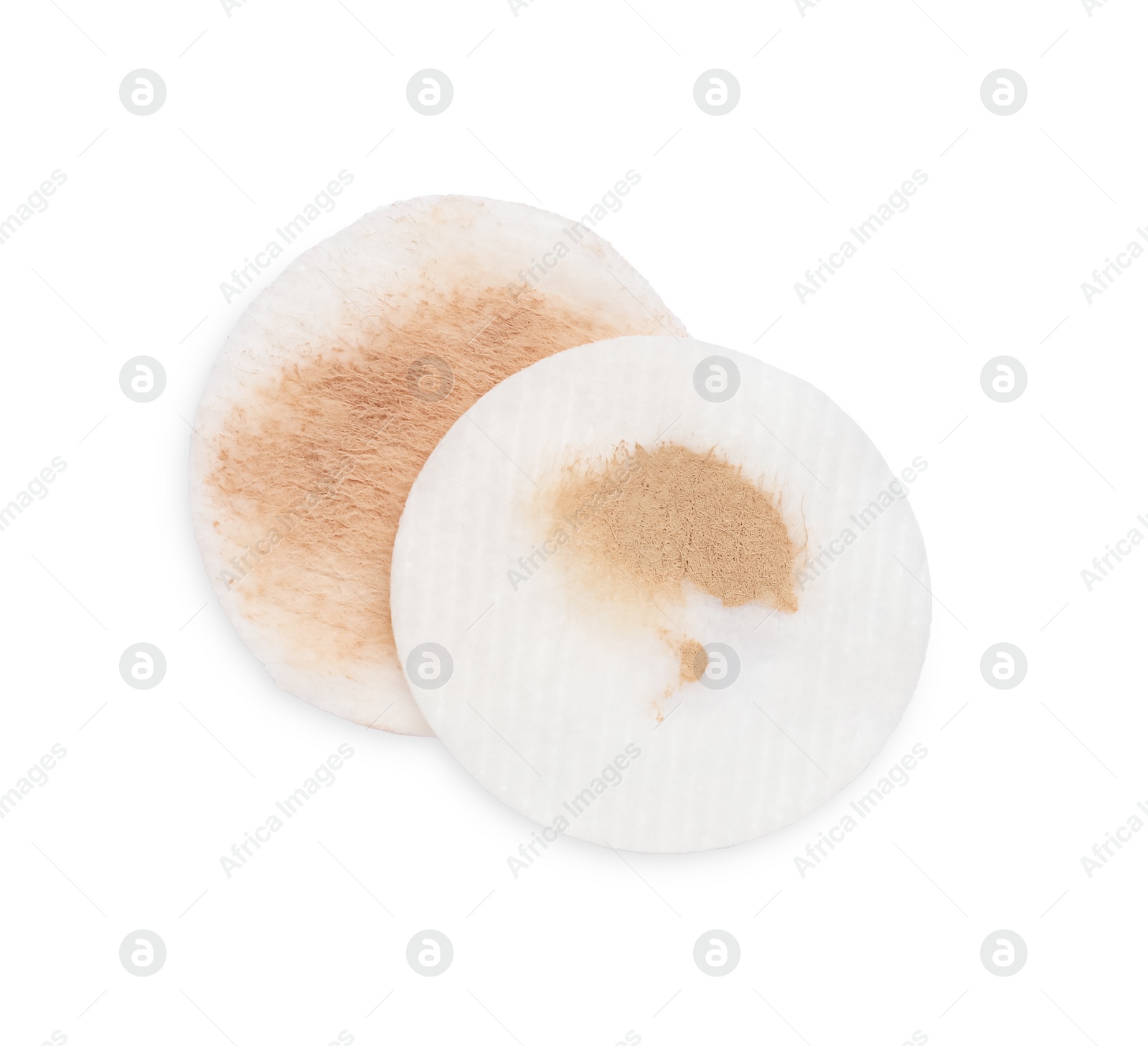 Photo of Dirty cotton pads after removing makeup on white background, flat lay