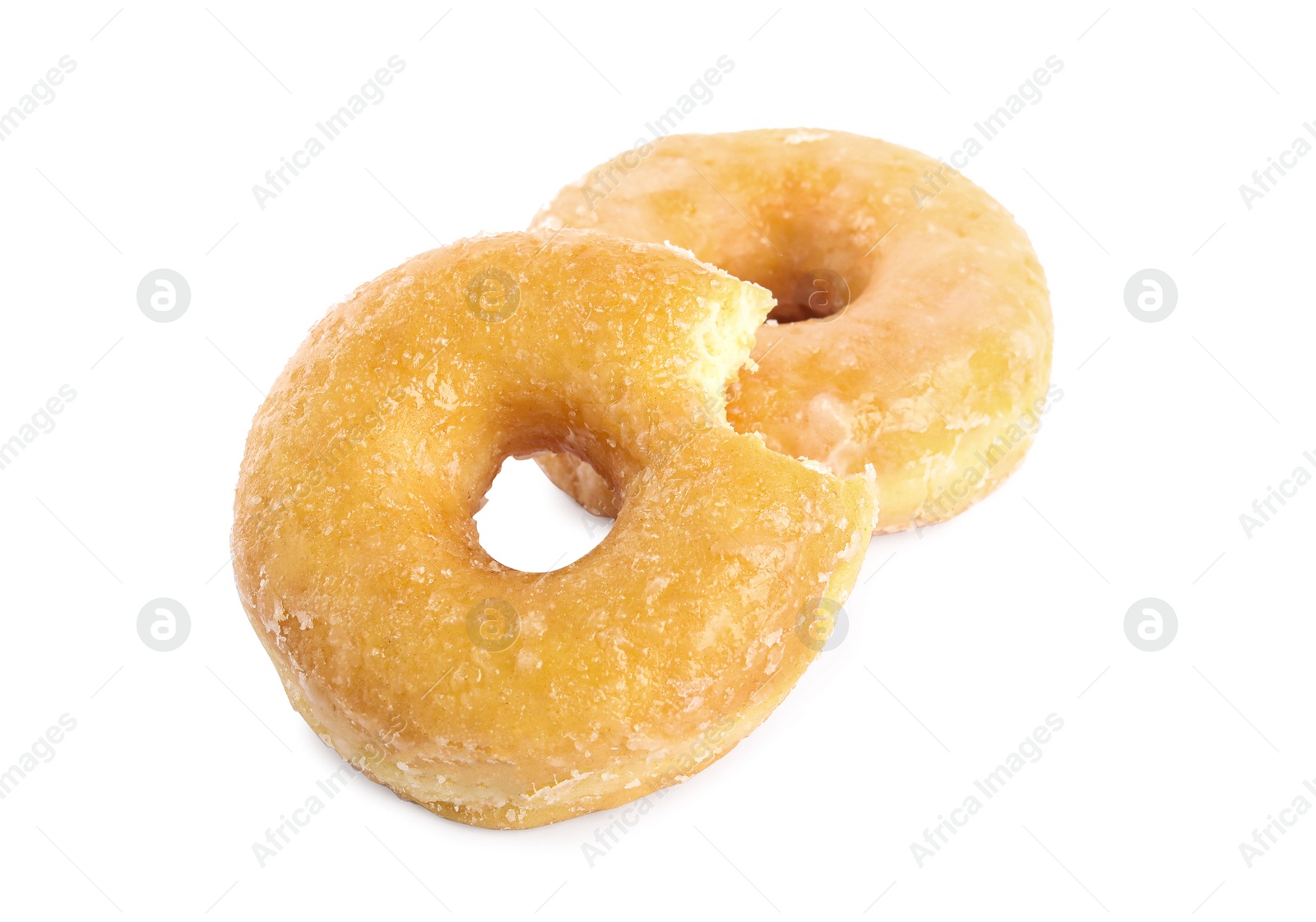 Photo of Sweet delicious glazed donuts on white background