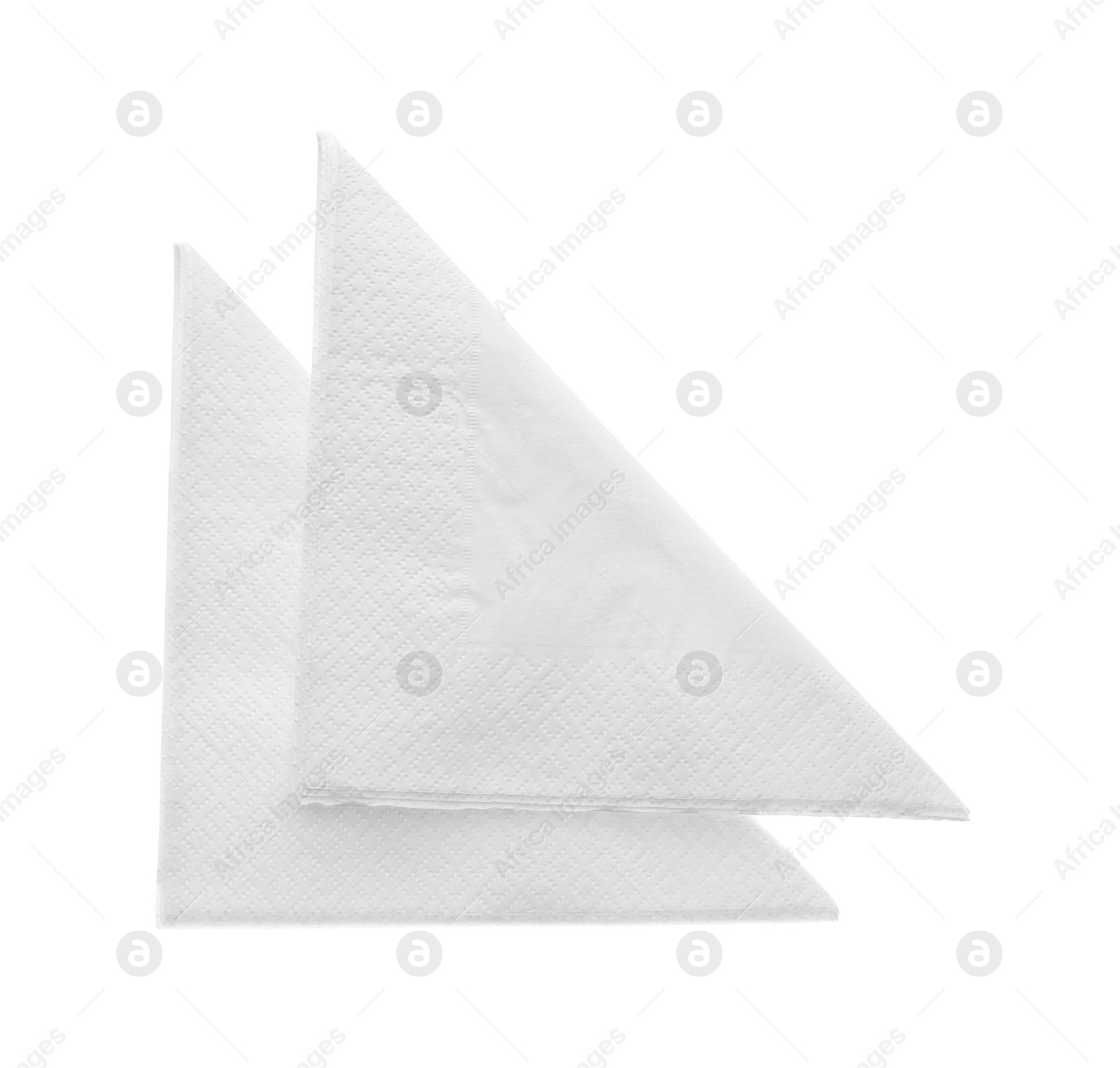 Photo of Folded clean paper tissues on white background, top view