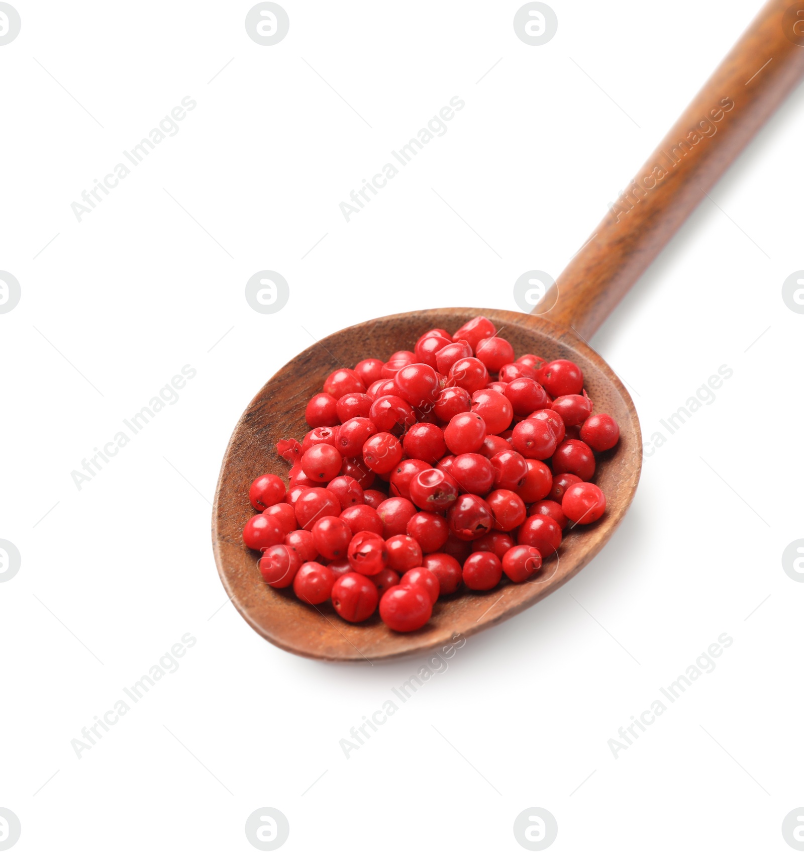 Photo of Aromatic spice. Red pepper in spoon isolated on white