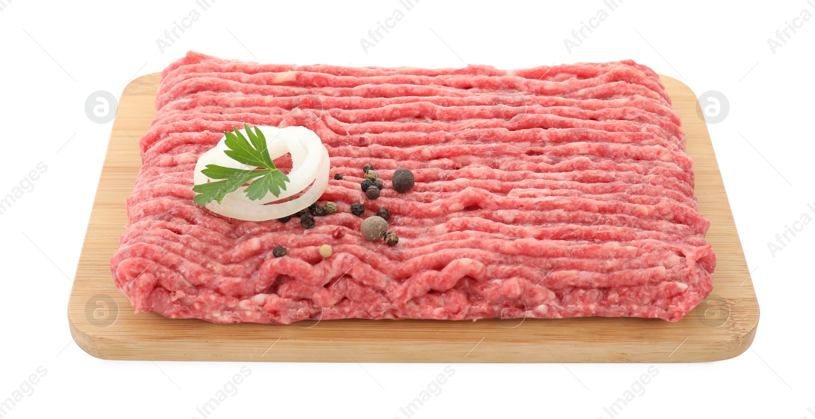 Photo of Board with raw ground meat, onion, peppercorns and parsley isolated on white