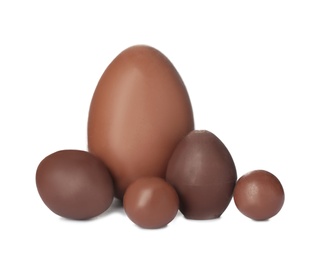 Photo of Tasty chocolate Easter eggs on white background