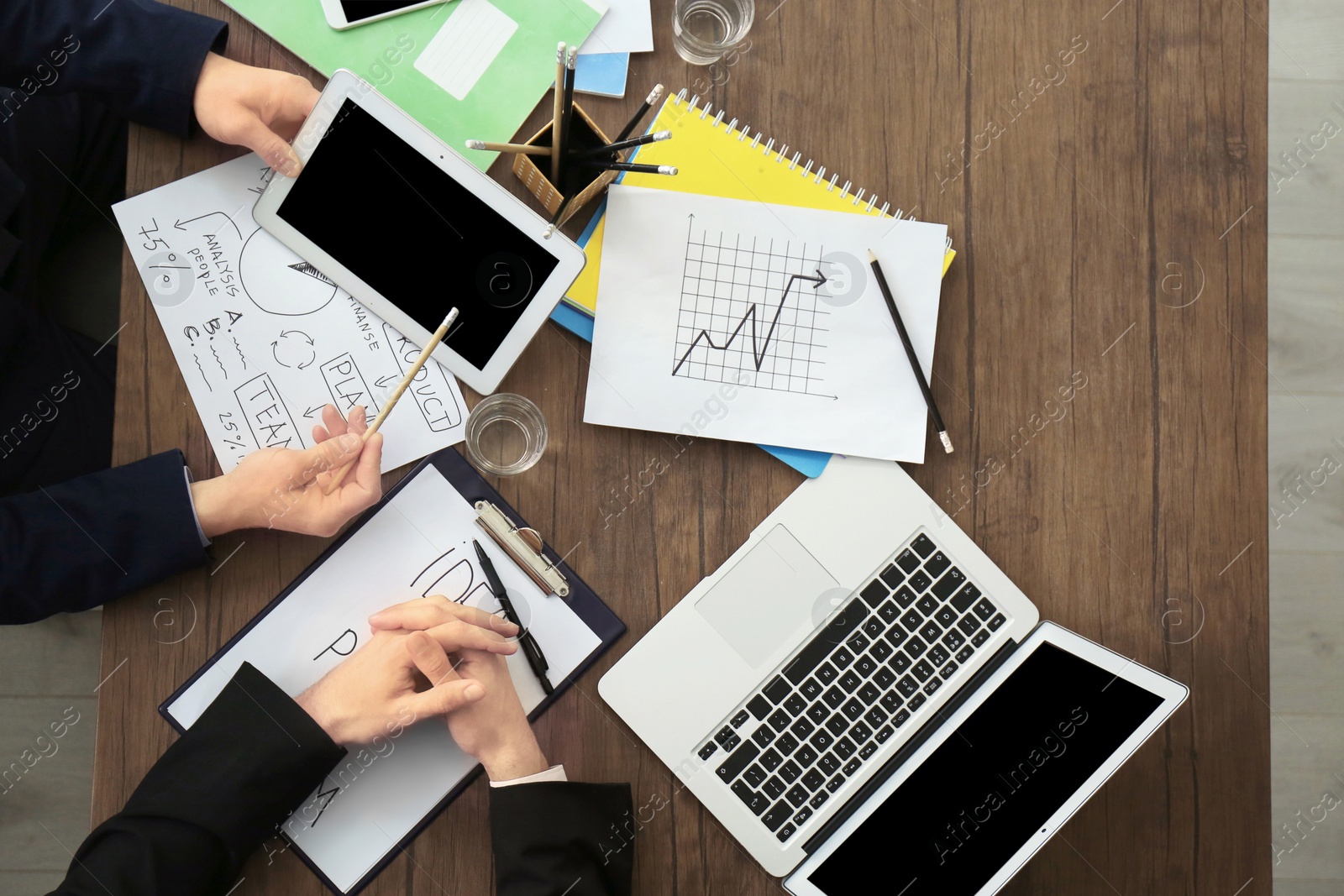 Photo of Business trainer and client working in office, closeup