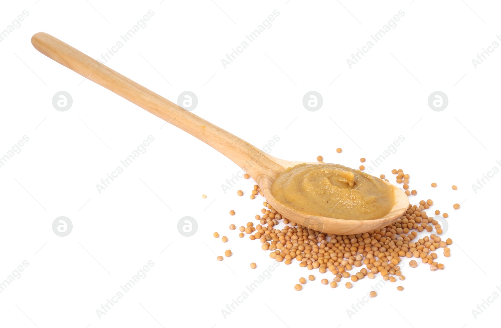 Photo of Fresh tasty mustard sauce in spoon and dry seeds isolated on white