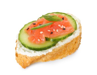 Photo of Tasty canape with salmon, cucumber and cream cheese isolated on white