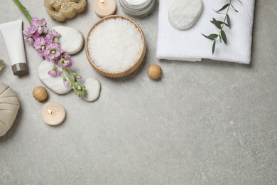 Photo of Flat lay composition with cosmetics on grey marble table, space for text. Spa treatment